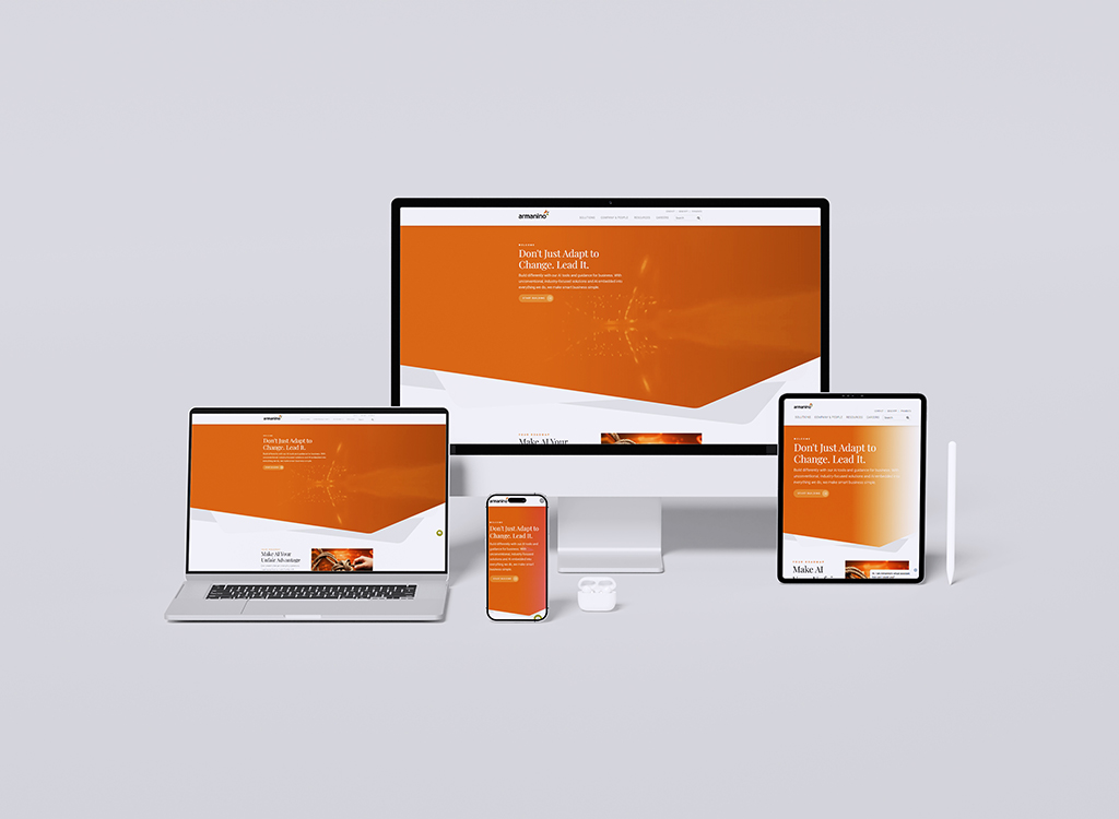 Mockup of a responsive website displayed on multiple devices, including a desktop computer, laptop, tablet, and smartphone, featuring a vibrant orange design with the tagline 