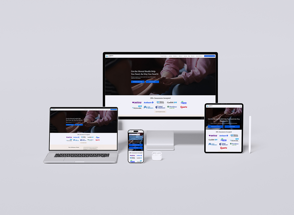 Image of multiple devices displaying a mental health service website, featuring a welcoming message about accessible mental health help and a list of accepted insurance providers. The setup includes a desktop monitor, laptop, tablet, and smartphone, emphasizing the website's compatibility across various platforms.