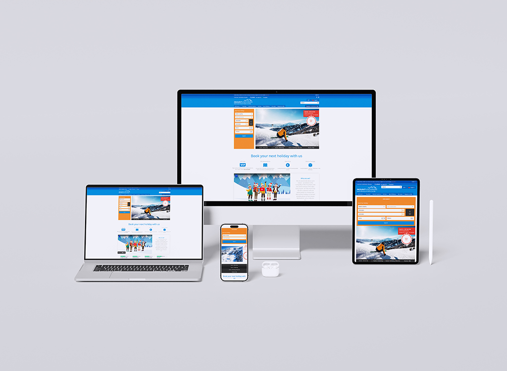 Image showcasing a responsive website for booking holidays, displayed on multiple devices including a desktop, laptop, tablet, and smartphone. The website features vibrant images, a user-friendly interface, and a booking form for holiday reservations.