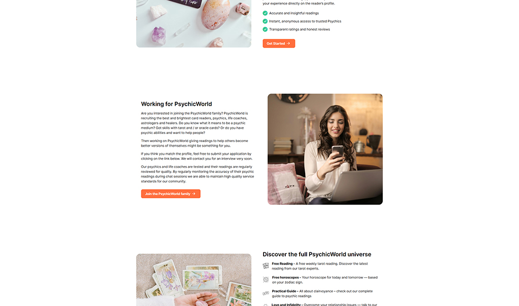 Image of a woman sitting at a desk, looking at her phone while surrounded by tarot cards and crystals, representing the PsychicWorld community and online psychic services.