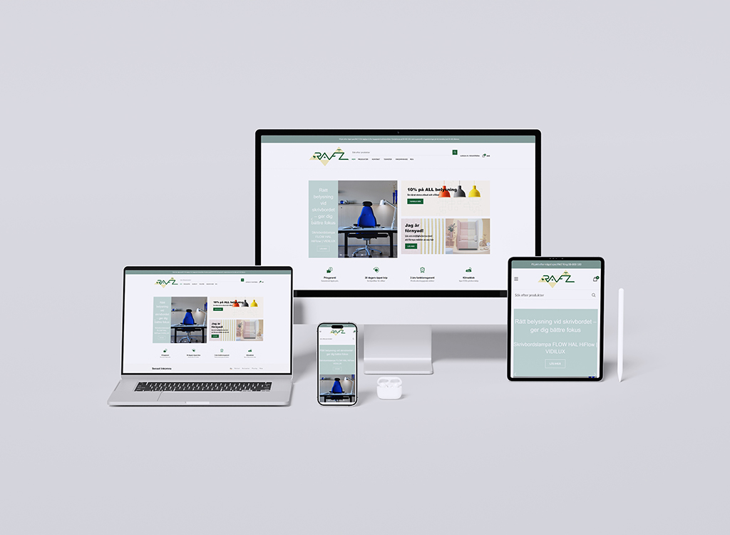 Image showcasing a responsive website design displayed on multiple devices including a desktop monitor, laptop, tablet, and smartphone. The website features a modern layout with promotional banners and product listings, emphasizing a clean and user-friendly interface.