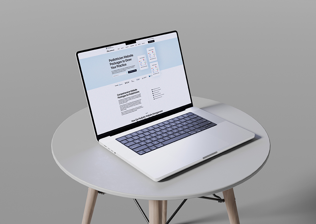 Modern laptop displaying a pediatrician website design on a minimalist table, showcasing website packages for pediatric practices aimed at enhancing online presence and growth.